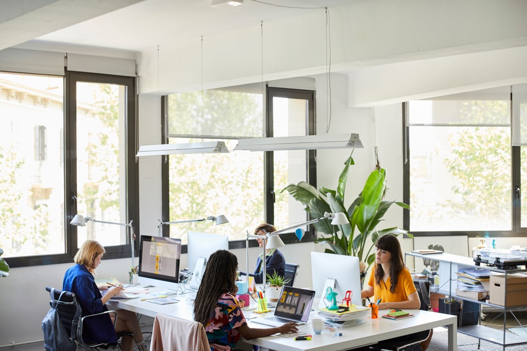 Image of people working in an office